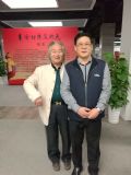 与中国美术家协会分党书记、驻会副主席、秘书长徐里先生在一起